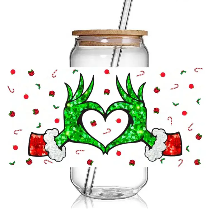 Grinch heart with candy canes, present and ornaments 16 oz glass cup